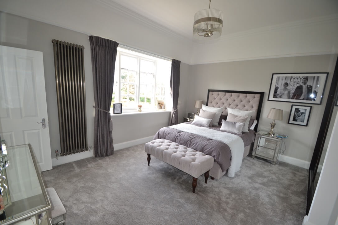 bedroom with gray carpeting
