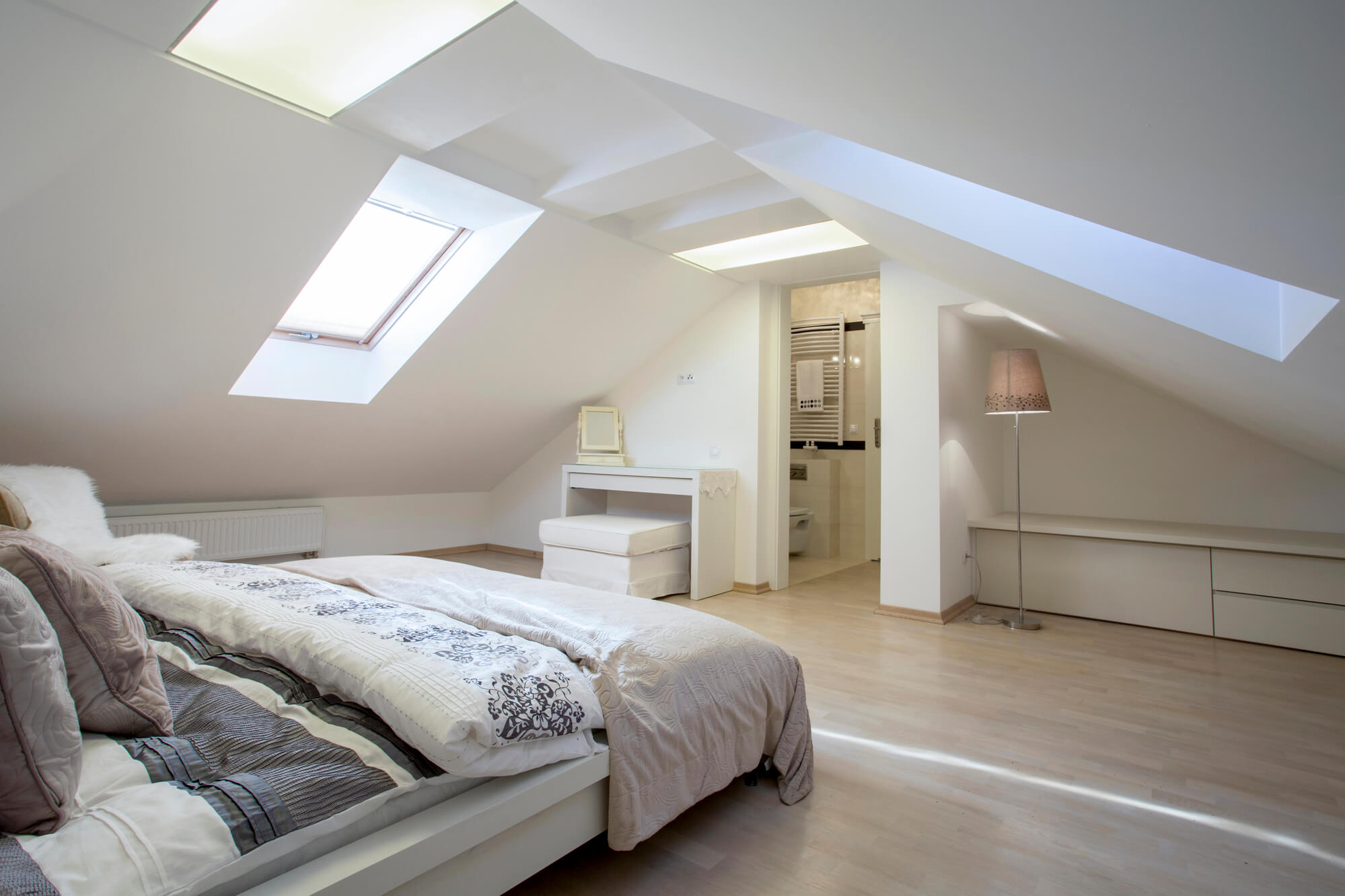 loft bedroom with linoleum flooring
