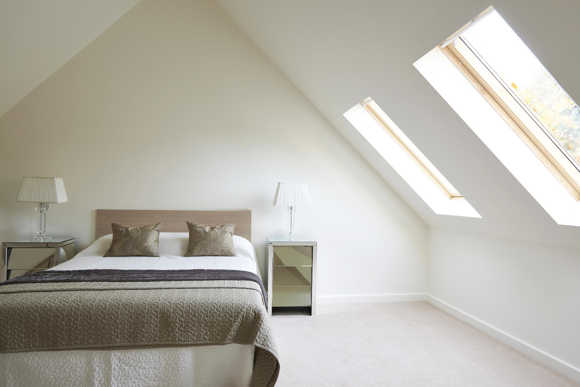 bedroom with light colour carpet